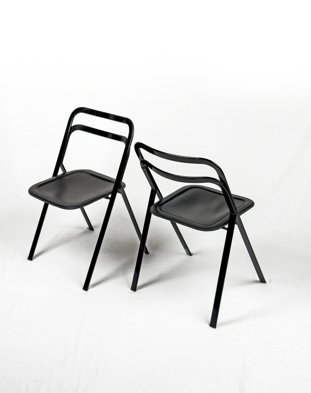 vintage metal and black leather folding “Clio” chairs by Giorgio Cattelan for Cidue, Italy 1970s