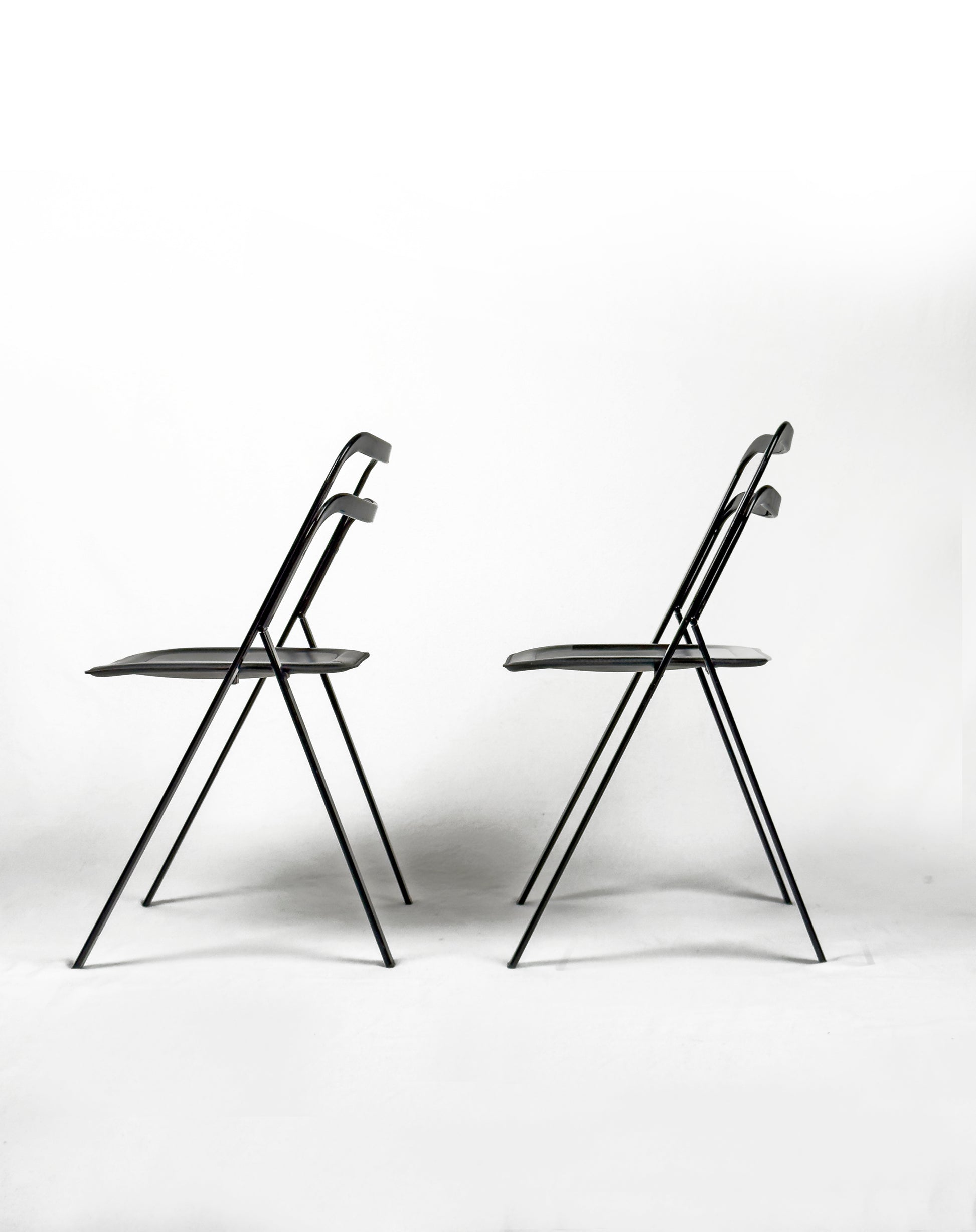 vintage metal and black leather folding “Clio” chairs by Giorgio Cattelan for Cidue, Italy 1970s