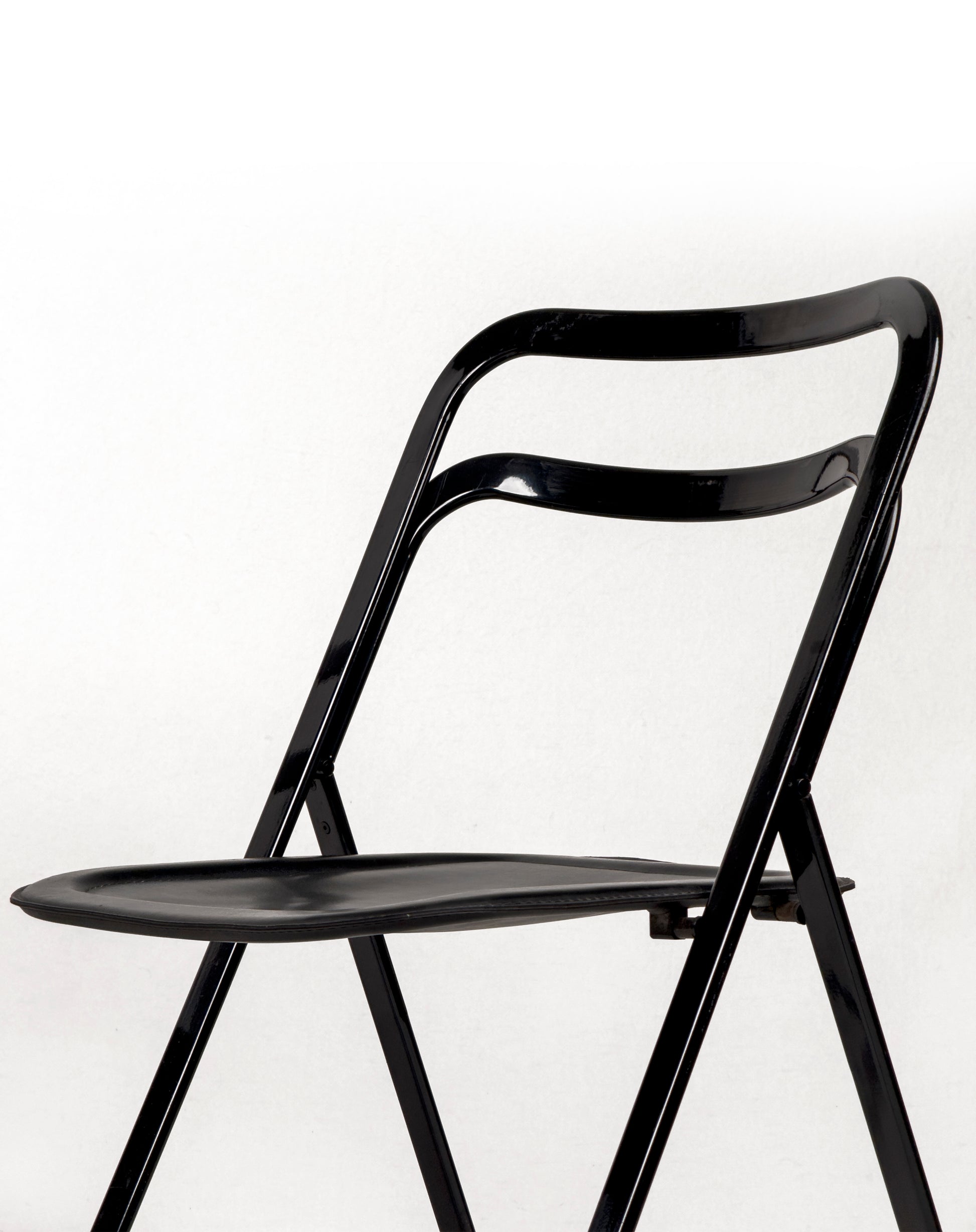 vintage metal and black leather folding “Clio” chairs by Giorgio Cattelan for Cidue, Italy 1970s